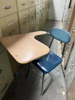 image of a blue chair/desk combo