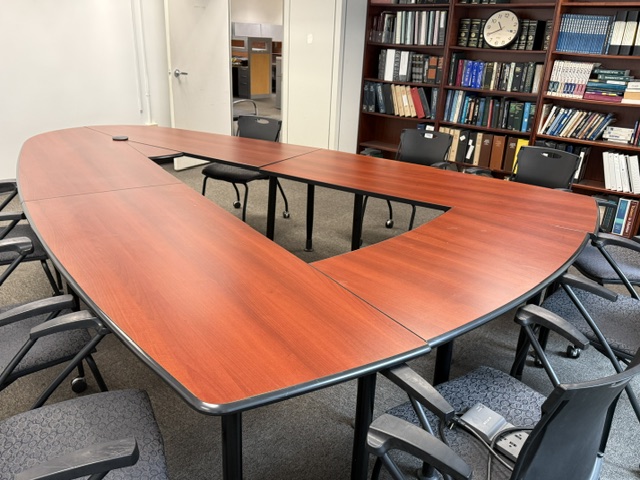 V-shaped conference table.