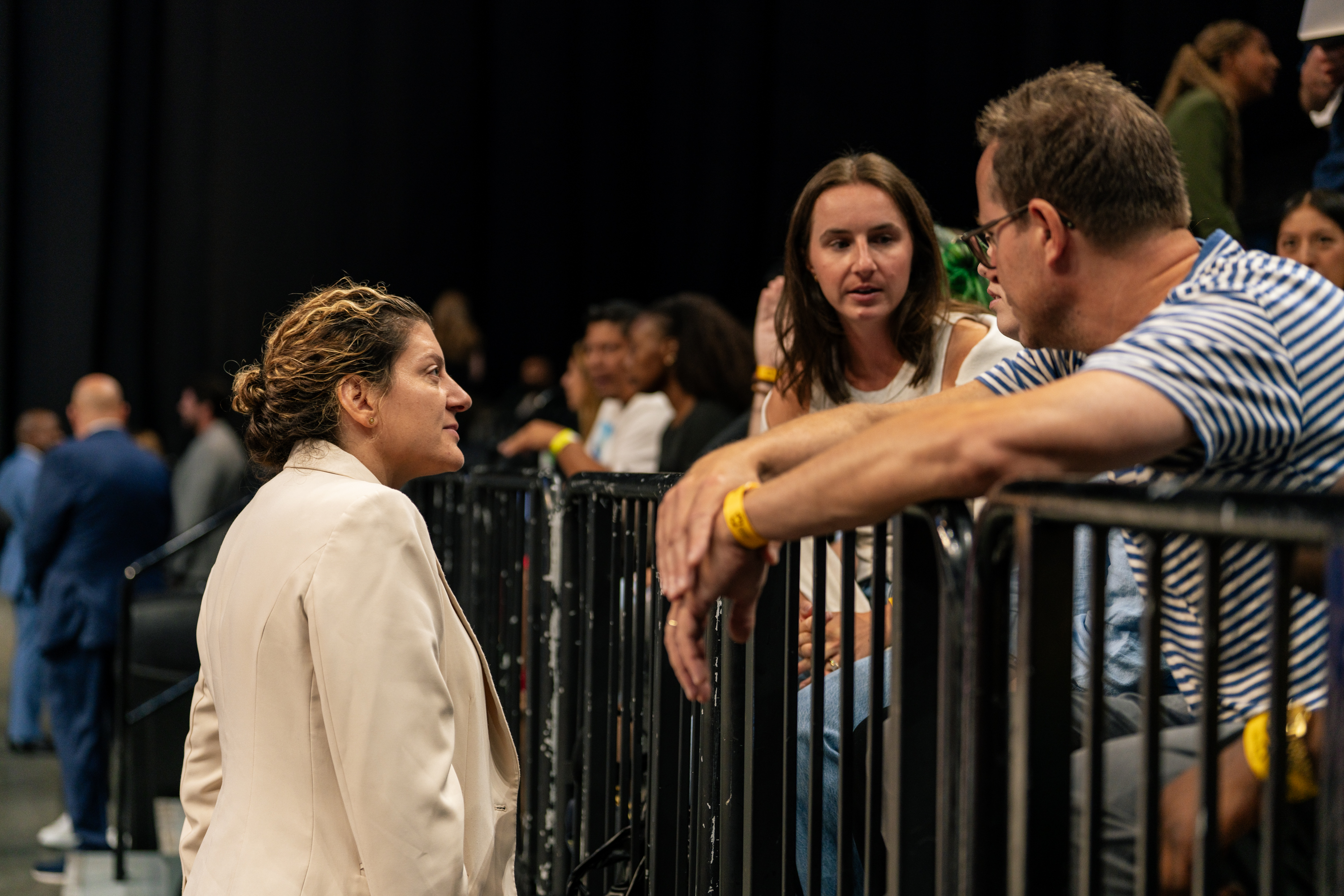 Woman talking to crowd