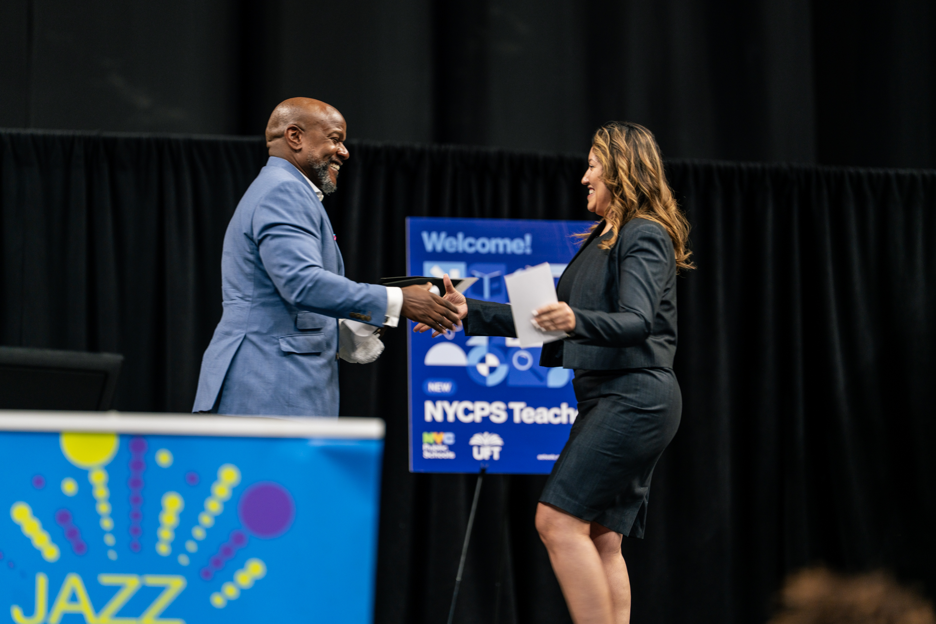 Patrick Fagan, Chief Talent/Human Resources Officer shaking hands with Chancellor Melissa Aviles-Ramos Patrick Fagan, Chief Talent/Human Resources Officer shaking hands with Chancellor Melissa Aviles-Ramos